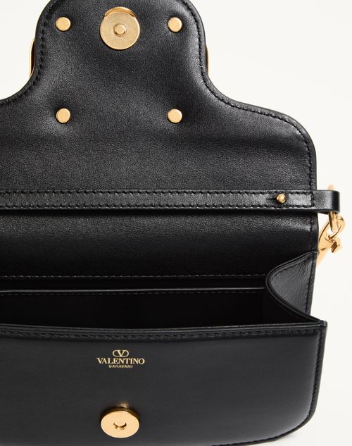Valentino Garavani - Valentino Garavani Locò Small Shoulder Bag In Calfskin - Black - Woman - Shoulder Bags